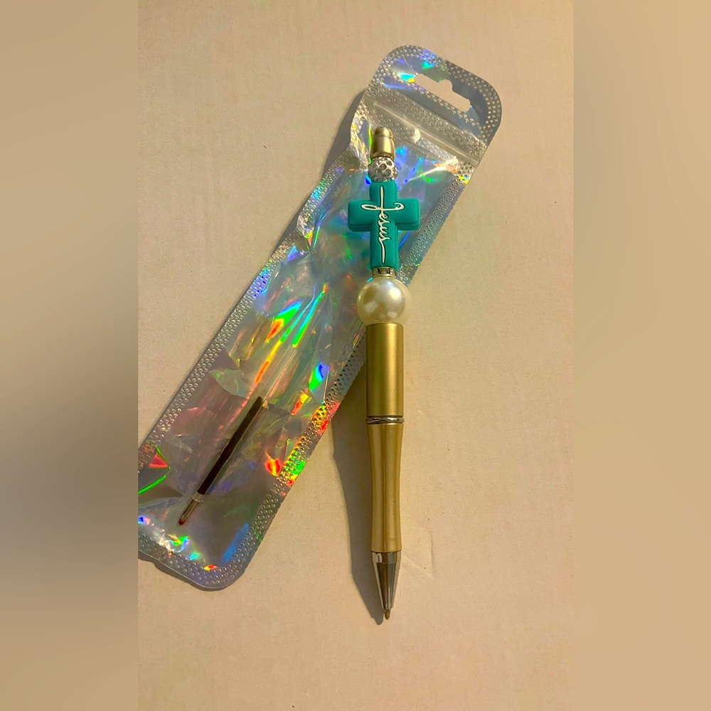 Hand beaded pen.